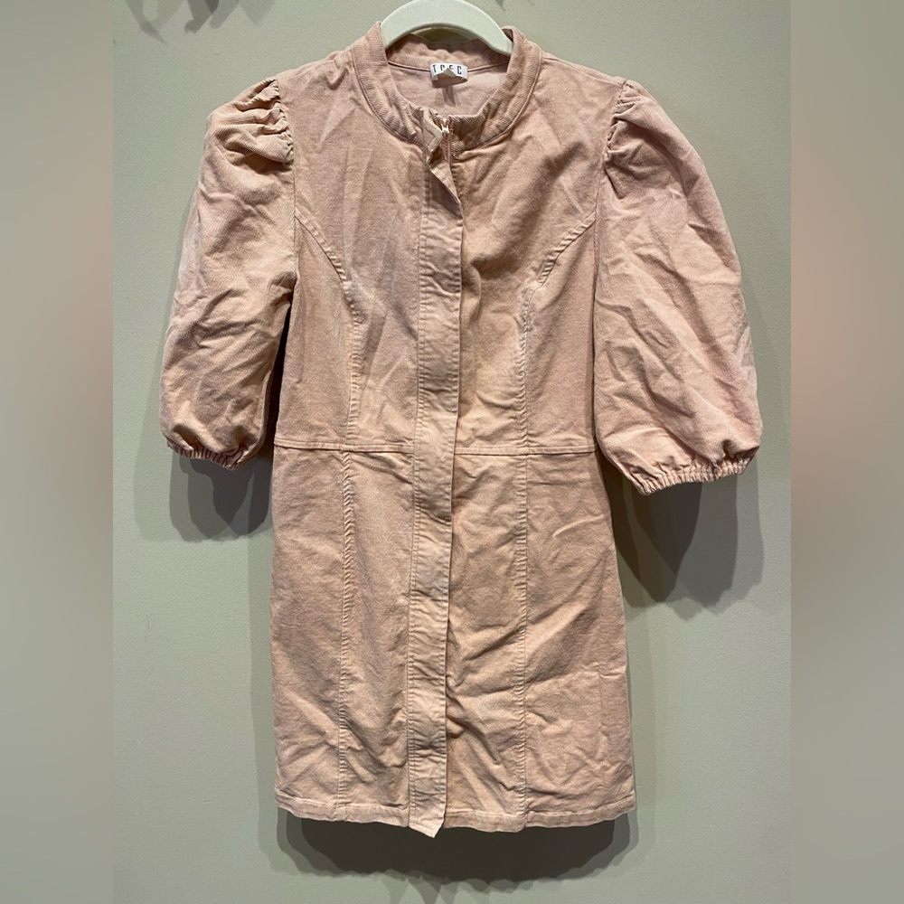 Corduroy zip up mini dress with puffy sleeves.